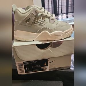 Jordan 4 Retro TD in Metallic Silver and Cream